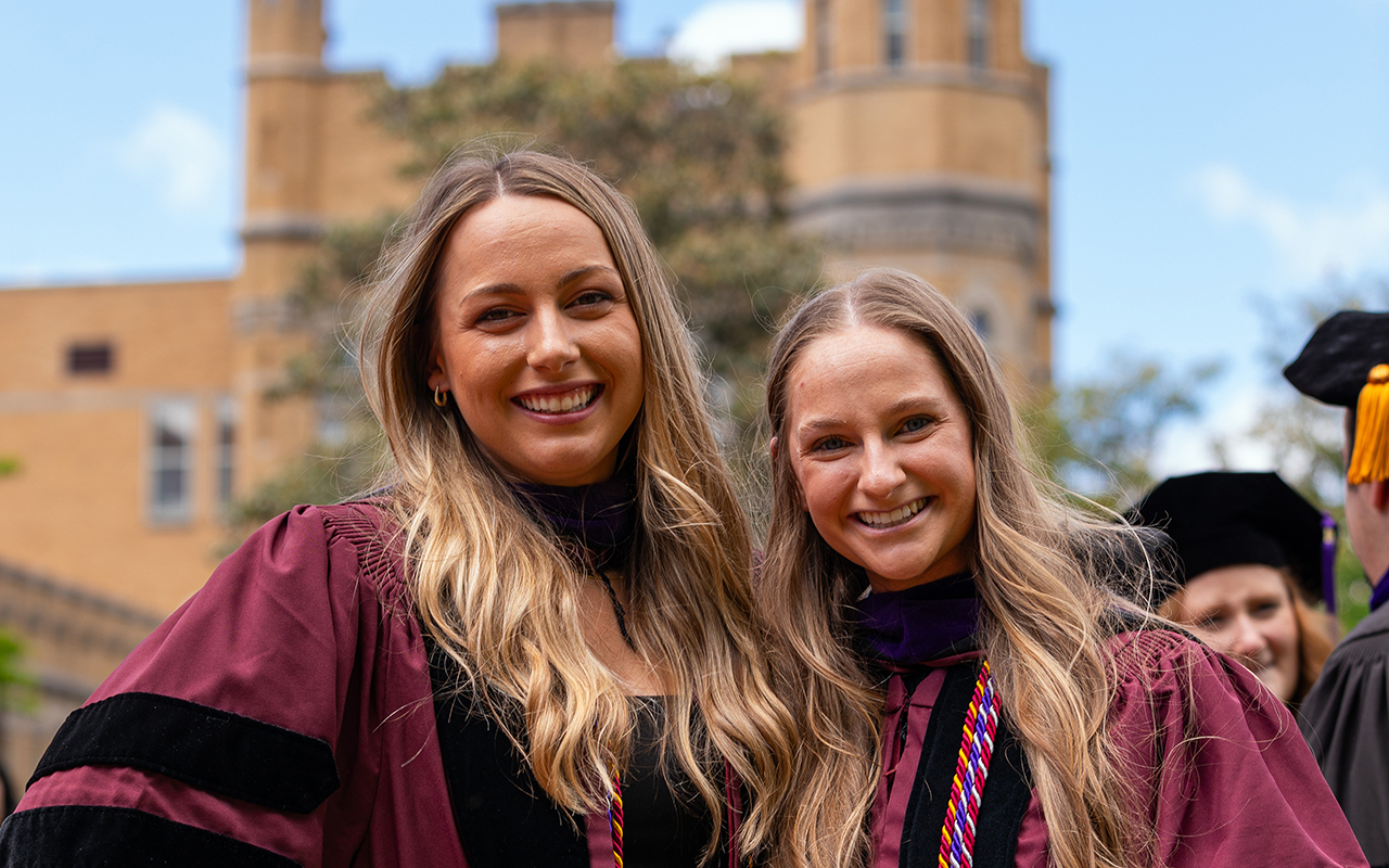 SIU Law grads posing in graduation regalia