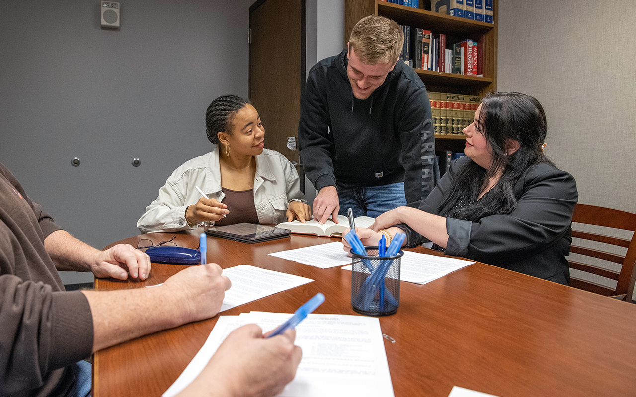SIU law students work in a legal clinic setting